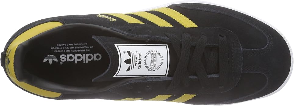 black and yellow adidas trainers