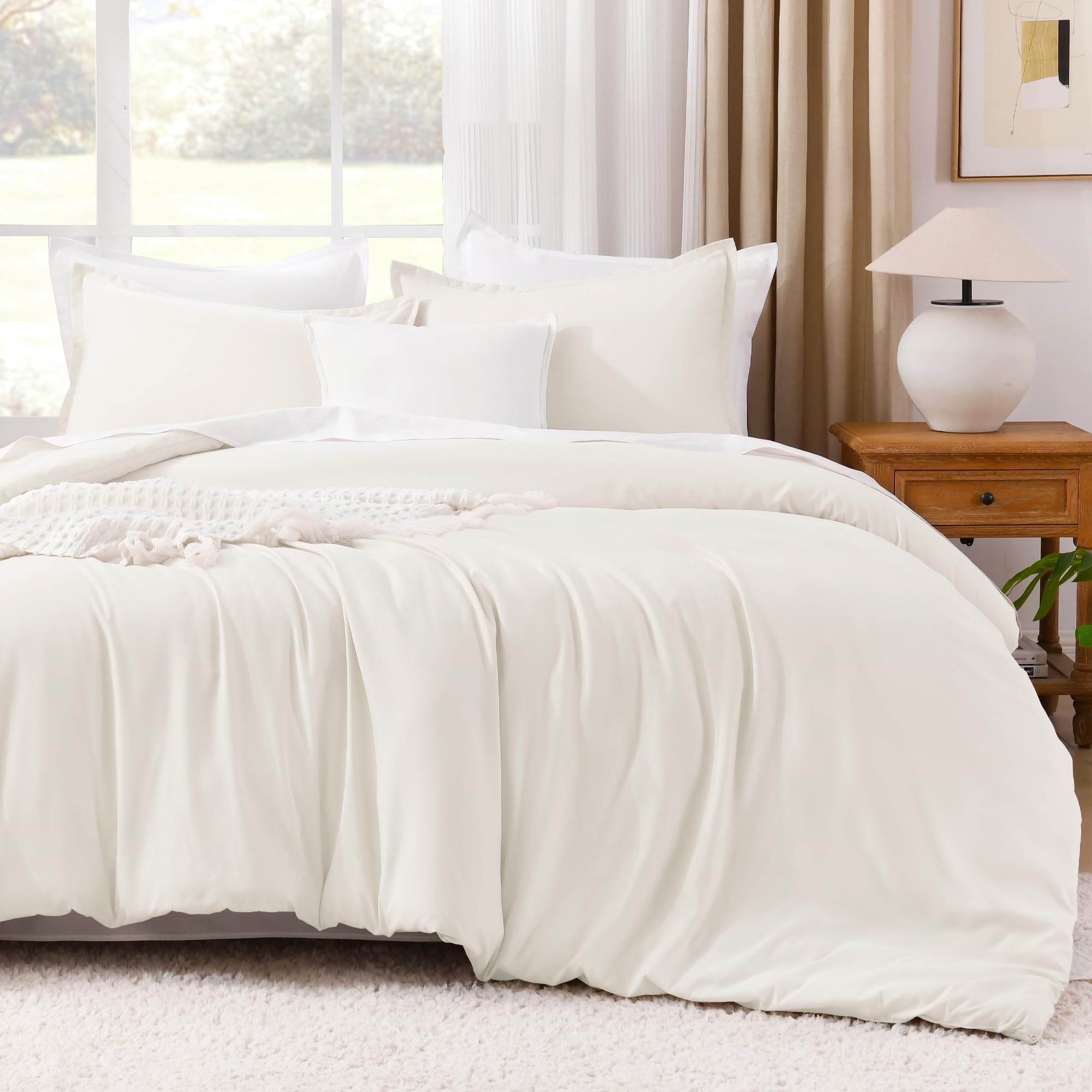 Photo 1 of Litanika Ivory Comforter Set King Size, 3 Pieces Lightweight Solid Bedding Comforter Set, All Season Fluffy Bed Set (104x90In Comforter & 2 Pillowcases)