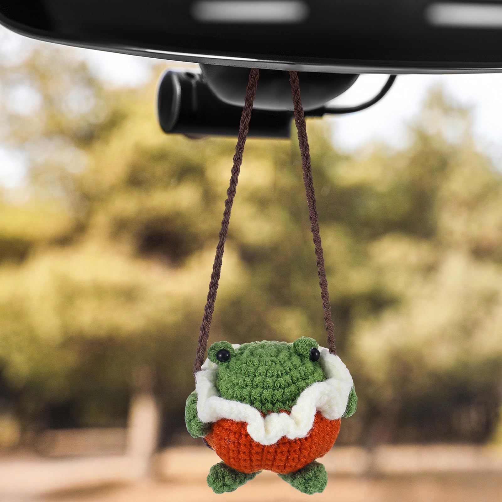 Photo 1 of Fanfanwin Halloween Pumpkin Frog Handmade Crochet Car Ornament Cute Knitted Rear View Mirror Accessories Sit on Swing Interior Car Charm Halloween Pumpkin Frog Spooky Gift for Women Man Party Decor