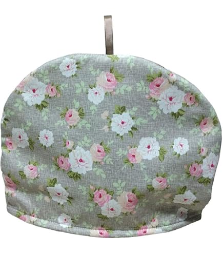 What a cute idea for a teapot! /sewing to a  tea the hidden pin cushion