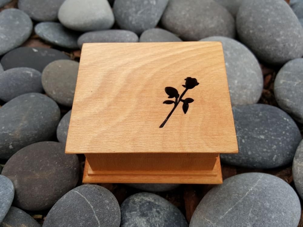 Custom engraved music box with a rose engraved on the top