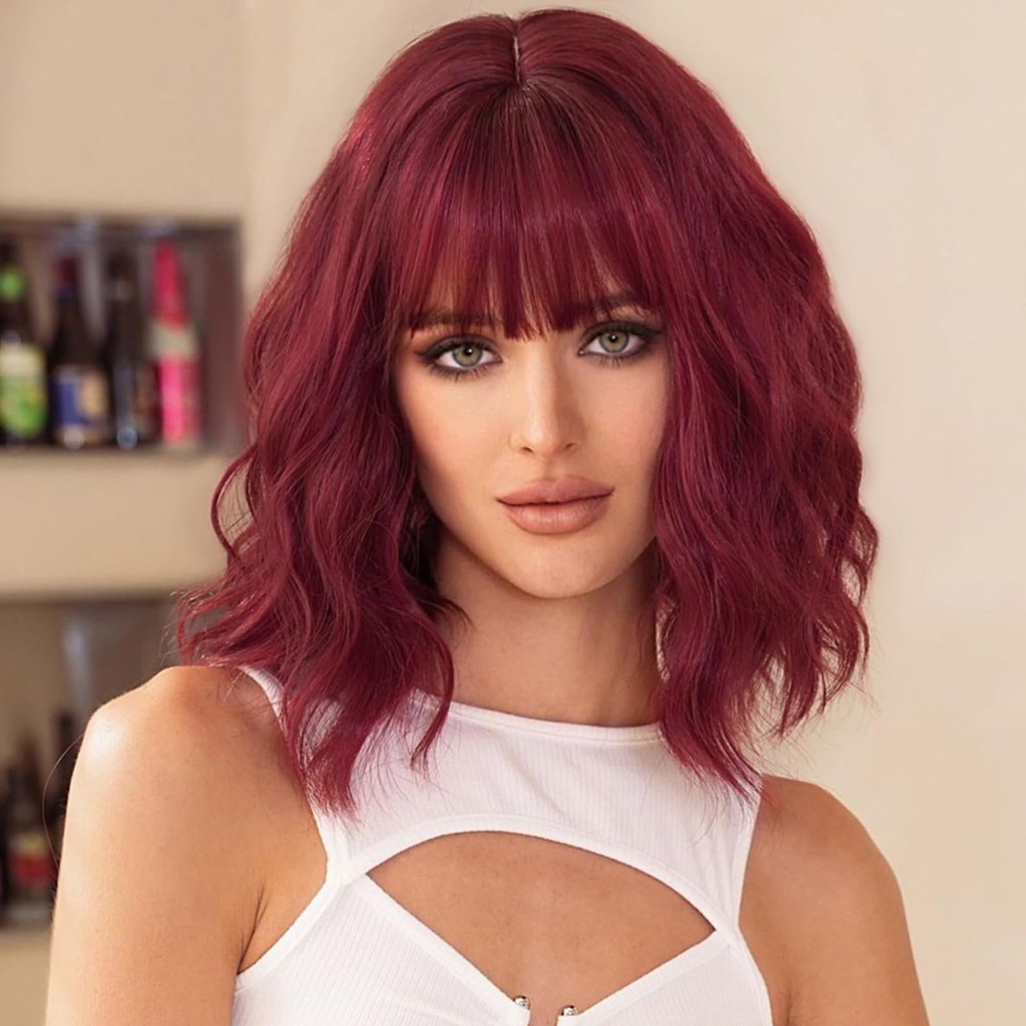 Photo 1 of Sashowna Burgundy Bob Wig For Women Short Wavy Wigs with Bangs Shoulder Length Hair Heat Resistant Curly Synthetic Wigs For Girls Daily Use(99J)