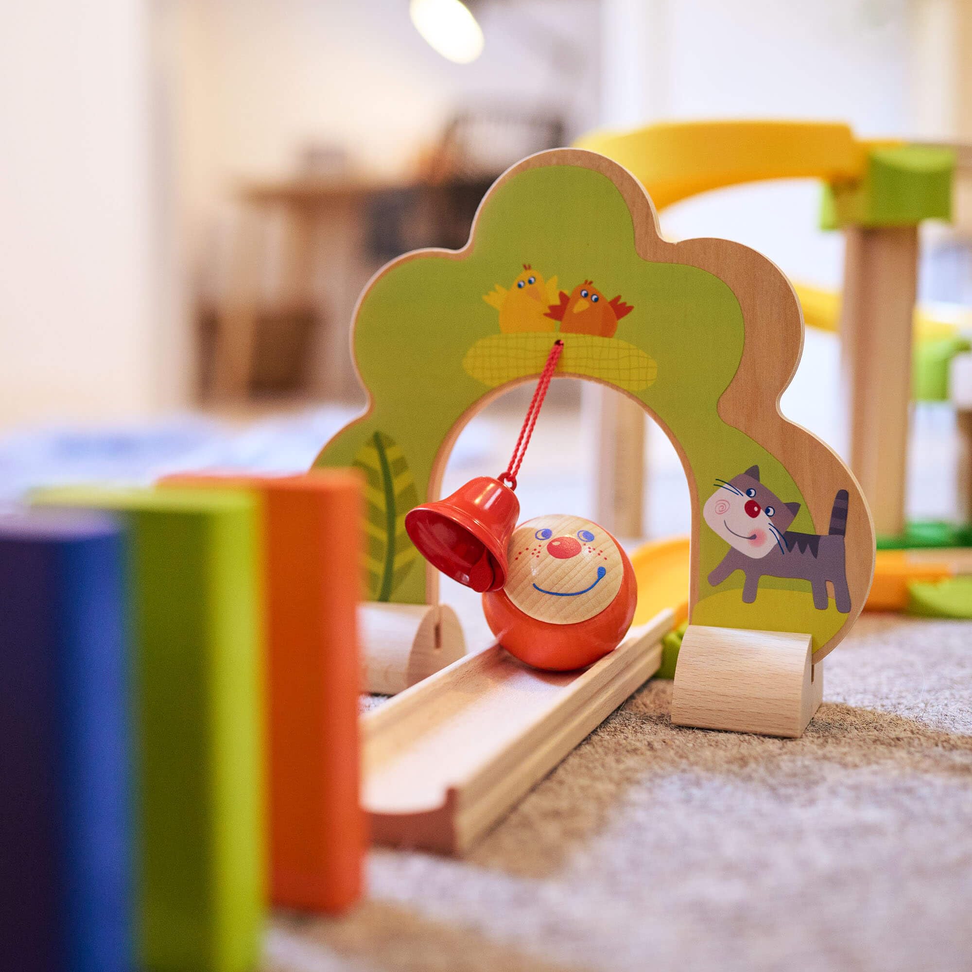 HABA Kullerbu Sim-Sala-Kling - 38 Piece Wooden & Plastic Train Track Set for Balls with Musical Effects and Domino Blocks