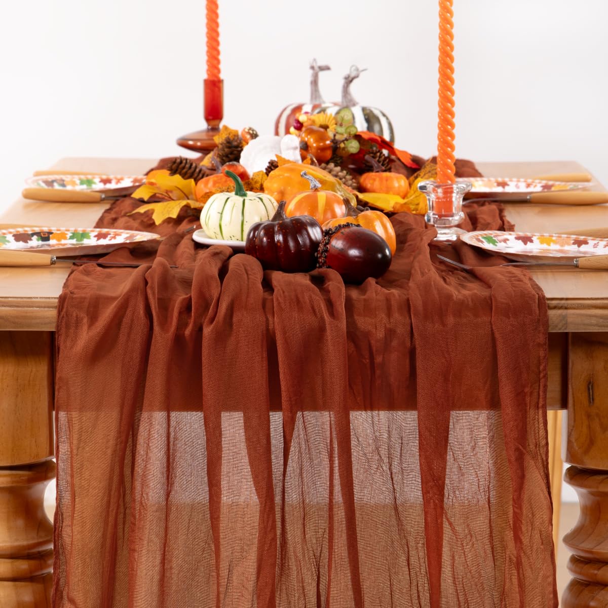 Photo 1 of DeZerlor Terracotta Cheesecloth Table Runner Fall Burnt Orange Cheese Cloth Table Runner 120 Inches Rust Thanksgiving Fall Table Decorations for Friendsgiving Wedding Bridal Baby Shower Party