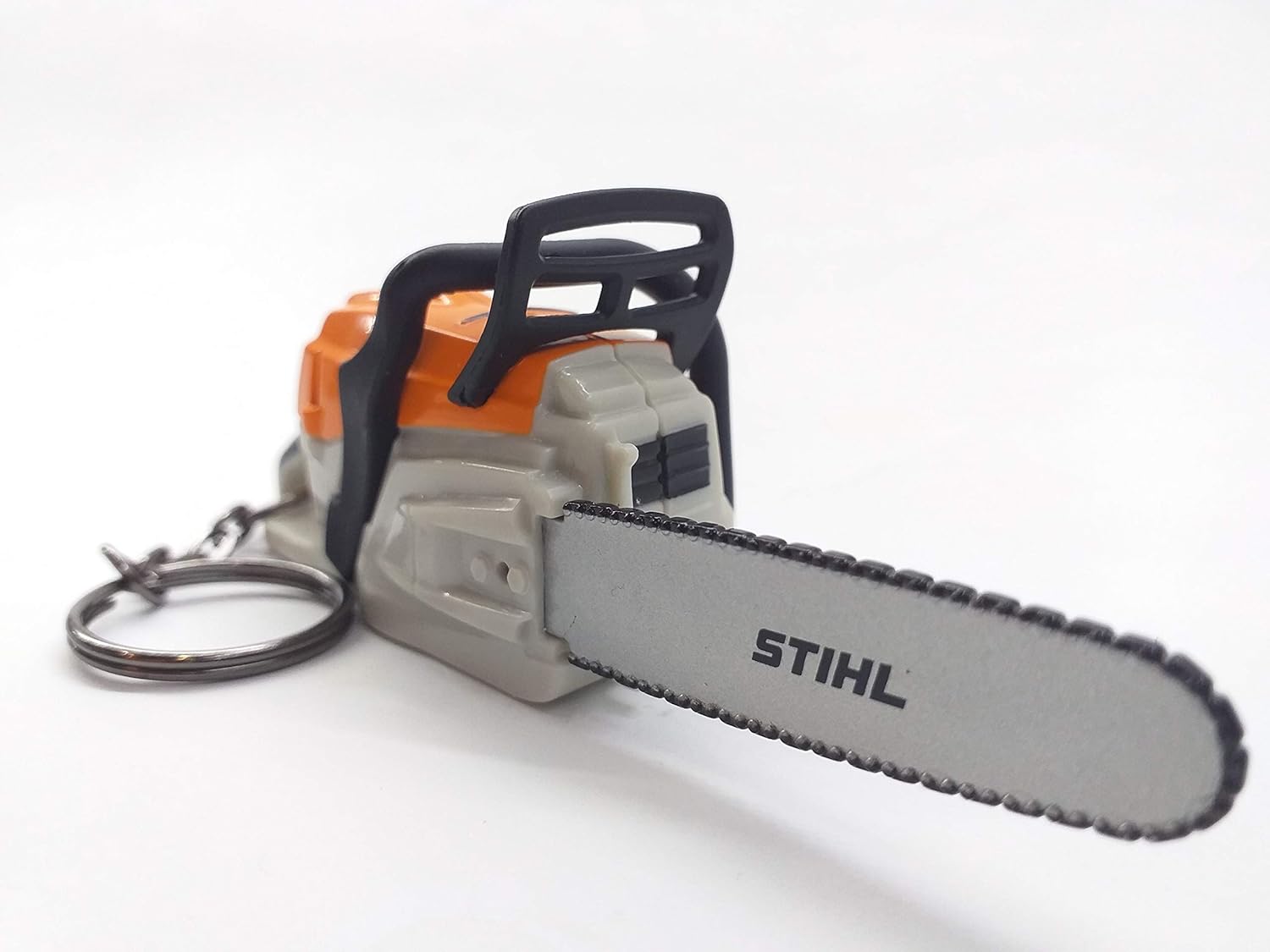 Stihl Battery Operated Chainsaw Keyring - With Sounds: Garden & Outdoor