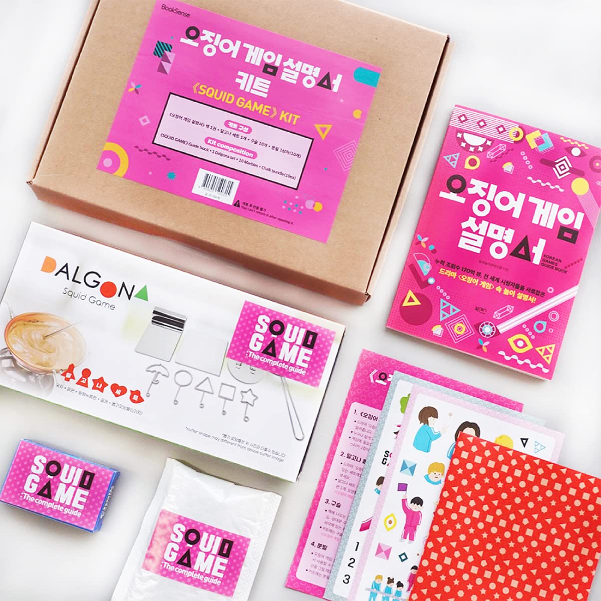 Squid Game Guide Kit (the Complete Guide Book+Dalgona Kit+2 Sticker Sheets+Ddakji Paper+10 Marbles+1 Box of Chalks) (English & Korean) 오징어 게임 설명서 키트
