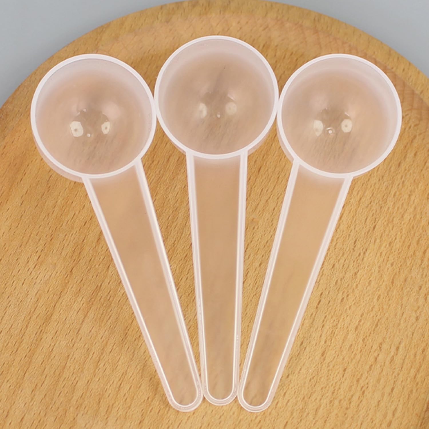 Photo 1 of 12 PCS Plastic Measuring Spoons Set,1 Teaspoon (20 ML) Long Handle Scoops for Measuring Coffee Tea Protein Milk Powder Grains Spices Powders Pet Food (Clear)