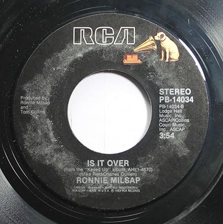 Ronnie Milsap 45 RPM Is It Over / She Keeps the Home Fires Burning