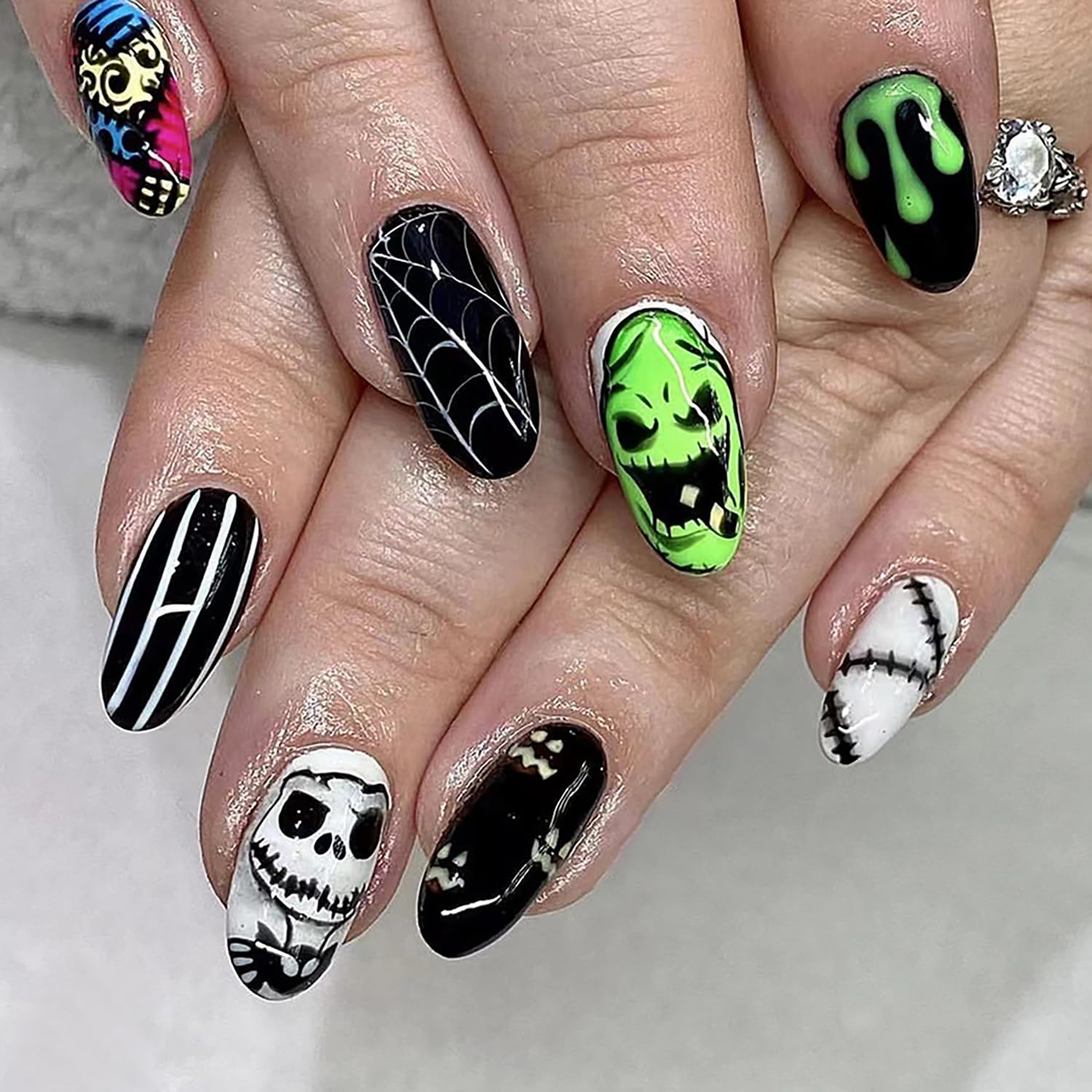 Photo 1 of 24 Pcs Halloween Press on Nails Medium Almond Fake Nightmare Before Christmas Acrylic With Spider Web and Green Monster Face Designs Glossy False Stick on for Women Girls
