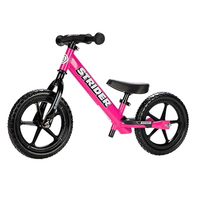 Strider 12” Sport Bike, Pink - No Pedal Balance Bicycle for Kids 1 to 4 Years - Includes Safety Pad, Padded Seat, Mini Grips & Flat-Free Tires - Tool-Free Assembly & Adjustments
