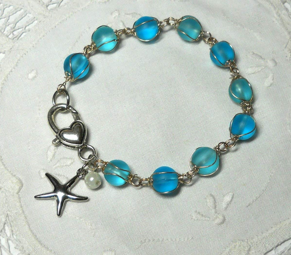Amazon Com Sea Glass Beaded Bracelet With Wire Wrapped Beads Silver Starfish White Pearl And Decorative Silver Clasp By Bethexpressions Handmade