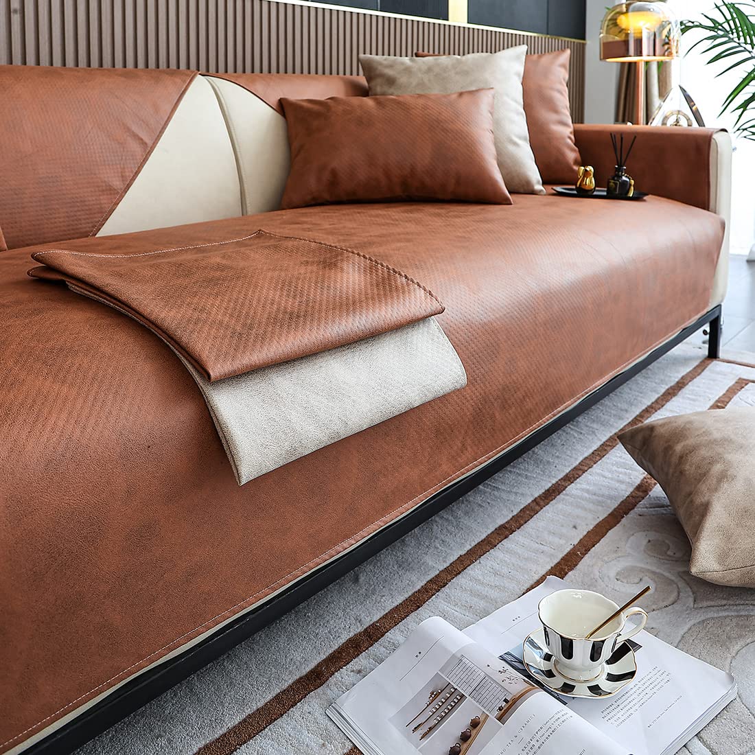 Photo 1 of vctops Vintage Leather Look Sofa Cover Water Resistant Non-Slip Sectional Couch Cover Sofa Slipcover for Dogs, Children, Pets Furniture Protector (Coffee,43"x94")