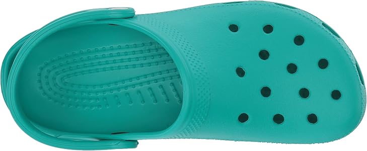 teal green crocs