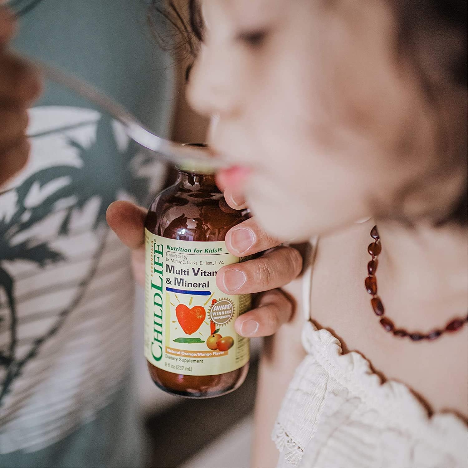 ChildLife Essentials Multi Vitamin and Mineral Natural for Infants, Babys, Kids, Toddlers, Children, and Teens, Orange/Mango Flavor, 8 Ounce: Health & Personal Care