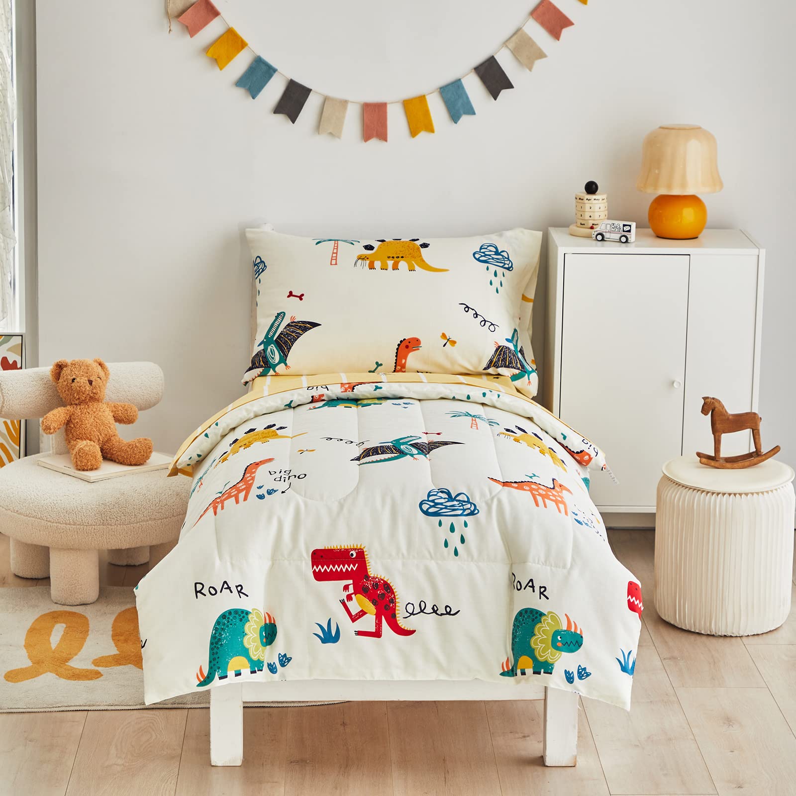 Photo 1 of Joyreap 4 Piece Dinosaur Toddler Bedding Set, 100% Cotton, Colorful Dino Print on Cream White, Includes Quilted Comforter, Fitted Sheet, Top Sheet, Pillow Case