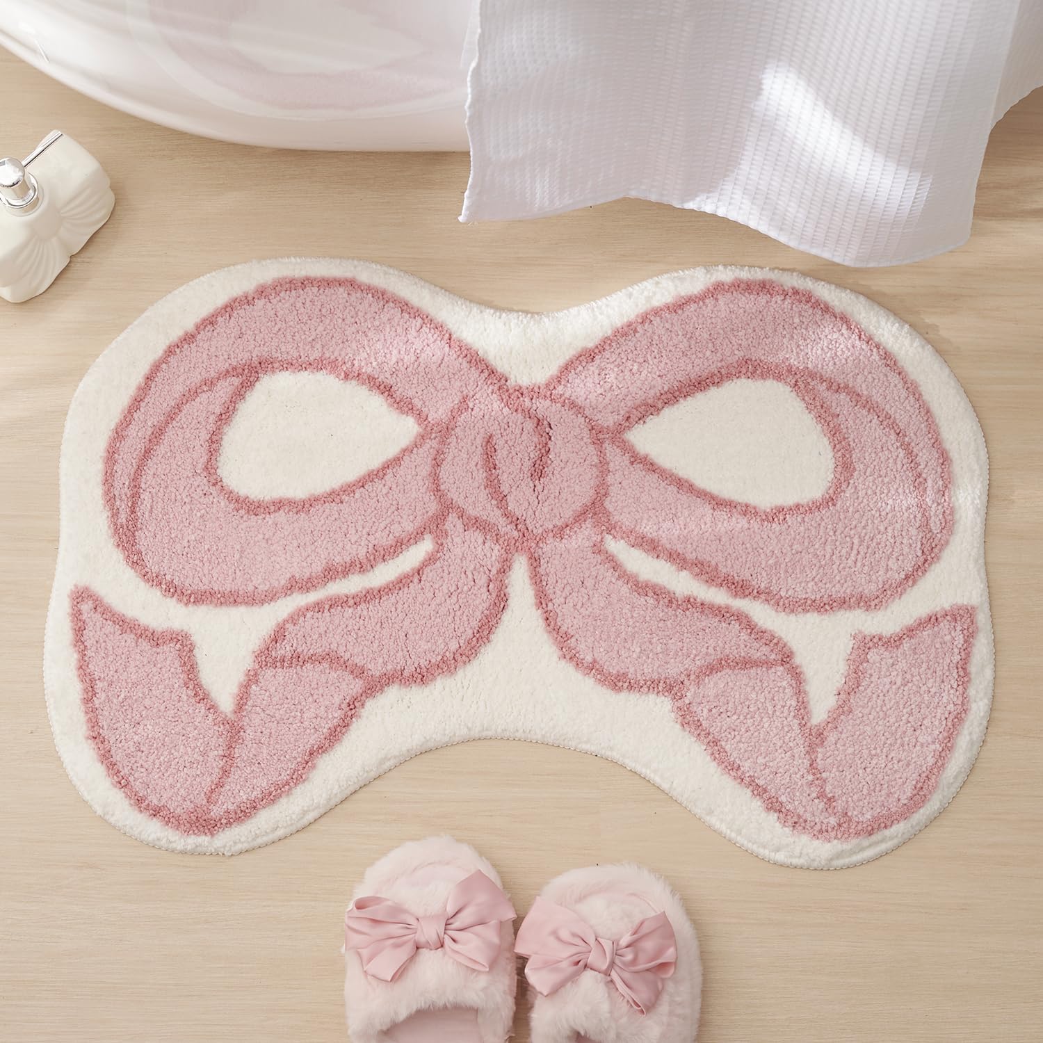 Photo 1 of ELDONE Pink Bow Shaped Bathroom Rugs, Small Cute Bath Mat Non Slip, Microfiber Aesthetic Trendy Funky Fun Preppy Girly Rug, Coquette Bow Decor for Girls Kids Bedroom, Nursery Room, Vanity, 18" x 27"