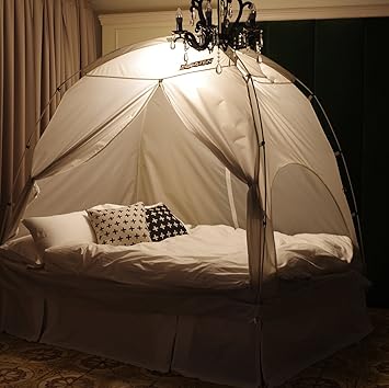 tent with bed inside
