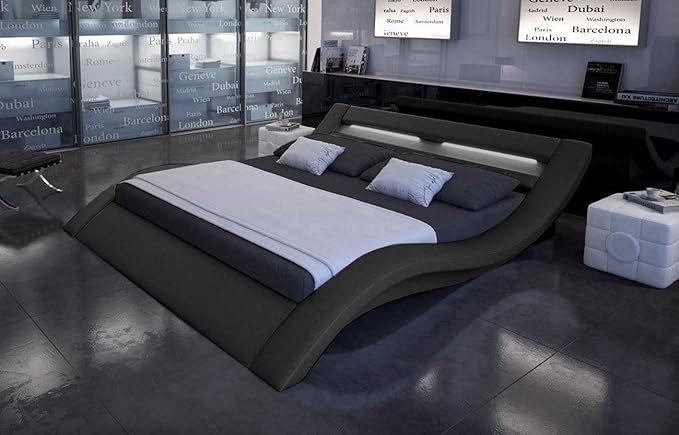 SAM® Polsterbett Innocent Bett Nerius II in schwarz 180 x 200 cm geschwungene Seitenteile Kopfteil mit Beleuchtung modernes a