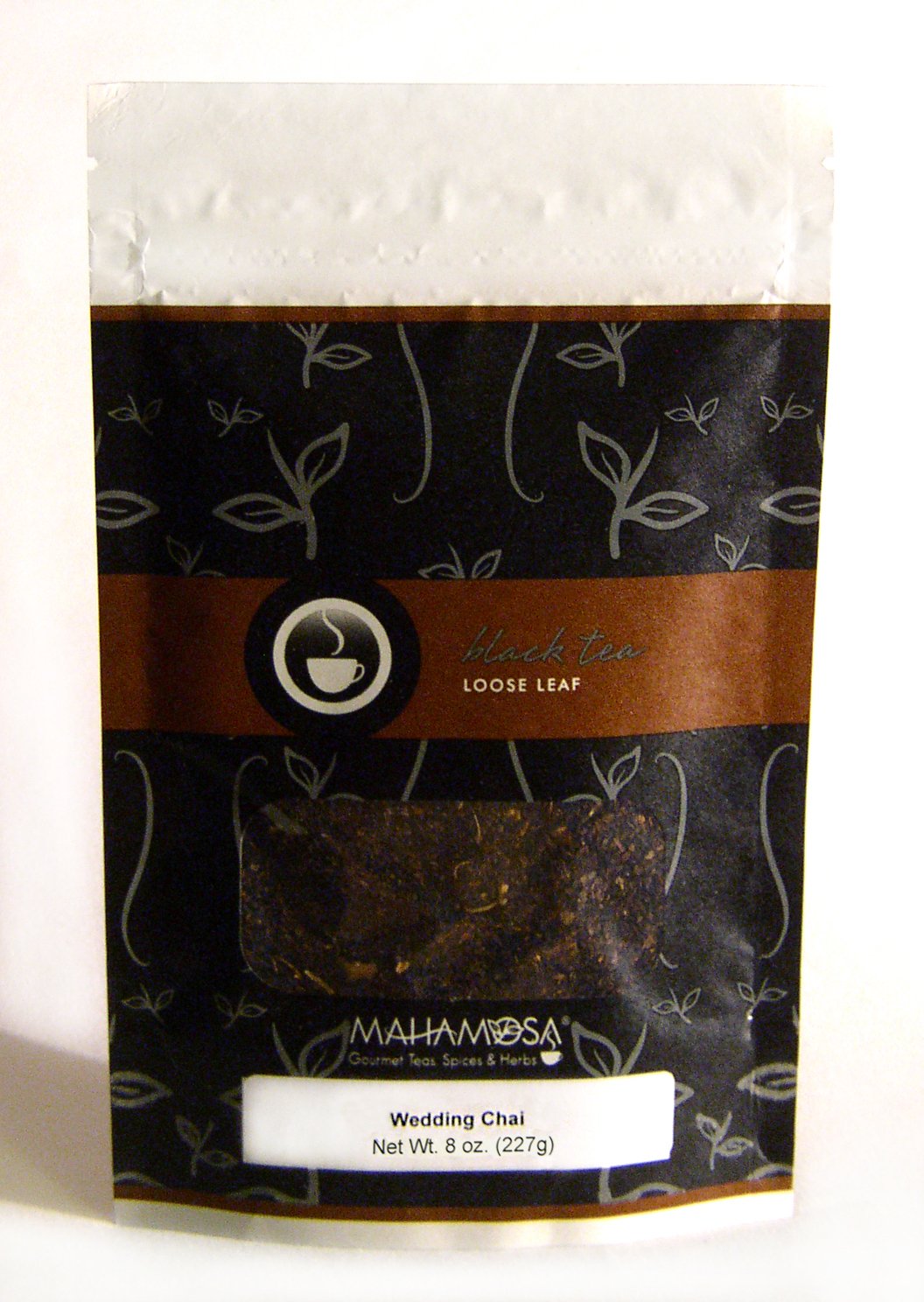 Looseleaf Tea Blend with crushed green cardamom, cardamom seeds and