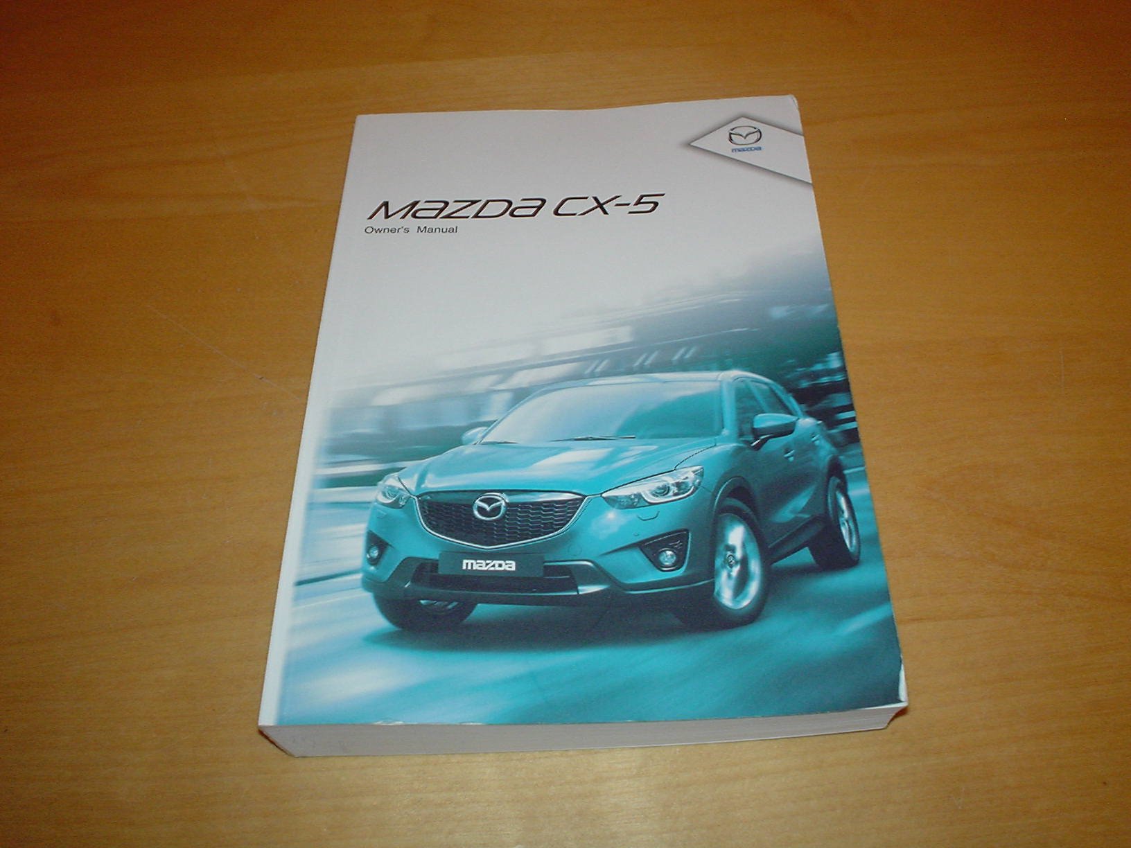 MAZDA CX-5 CX5 OWNERS MANUAL HANDBOOK (2010 -2013) - SKYACTIV-G 2.0  SKYACTIV-D 2.2 - OWNER'S HAND BOOK MANUAL Paperback – 2011