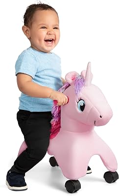 Shimmer l'Unicorno Magico con luci e suoni interattivi, giocattolo cavalcabile rosa, per bambini da 1 a 3 anni
