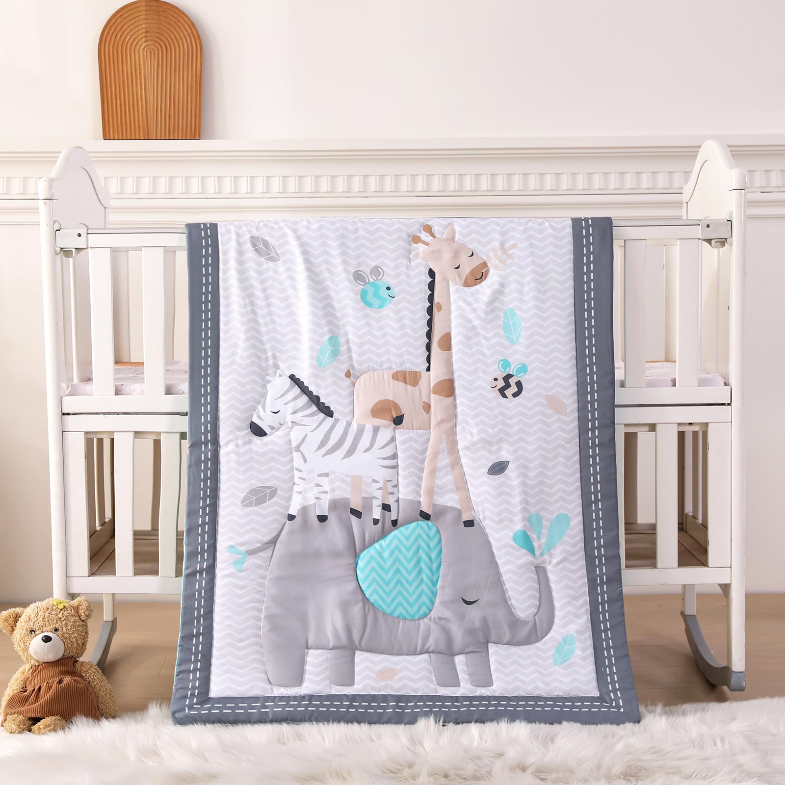 Photo 1 of Wowelife Mini Crib Bedding Set Boy, 3 Piece Baby Bedding Set Nursery Bedding Set Elephant, Giraffe, Zebra Breathable Soft for Baby Boy with Comforter, Crib Fitted Sheet and Crib Skirt, Gray