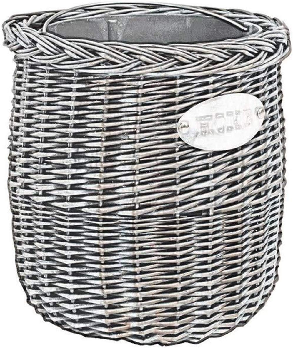 Bote de basura Mimbre Basura En Casa De Forma Creativa Colocado En La