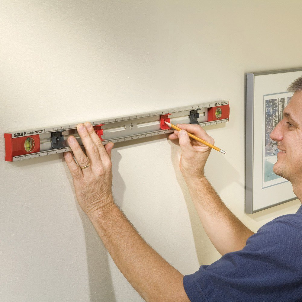 Tools that make hanging pictures on your walls easy