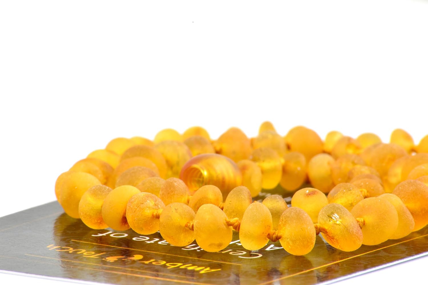 RAW Baltic Amber Necklace (Unisex) 13 inch. Unpolished Natural Amber from Baltic Region (Honey) : Baby