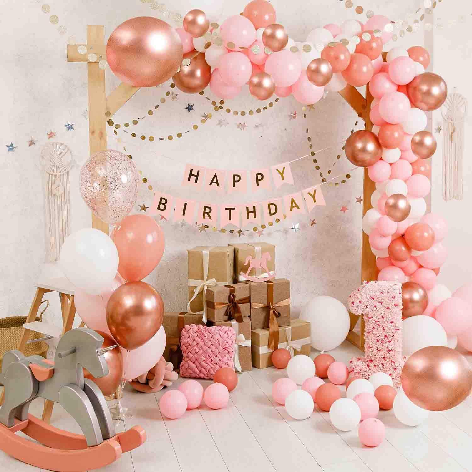 pink white and gold decorations for baby shower