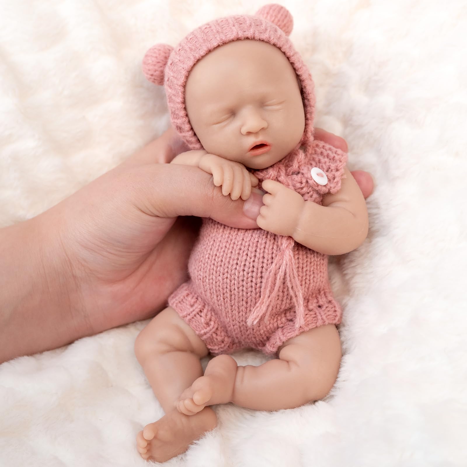 Vollence 8-inch silicone baby doll at it...