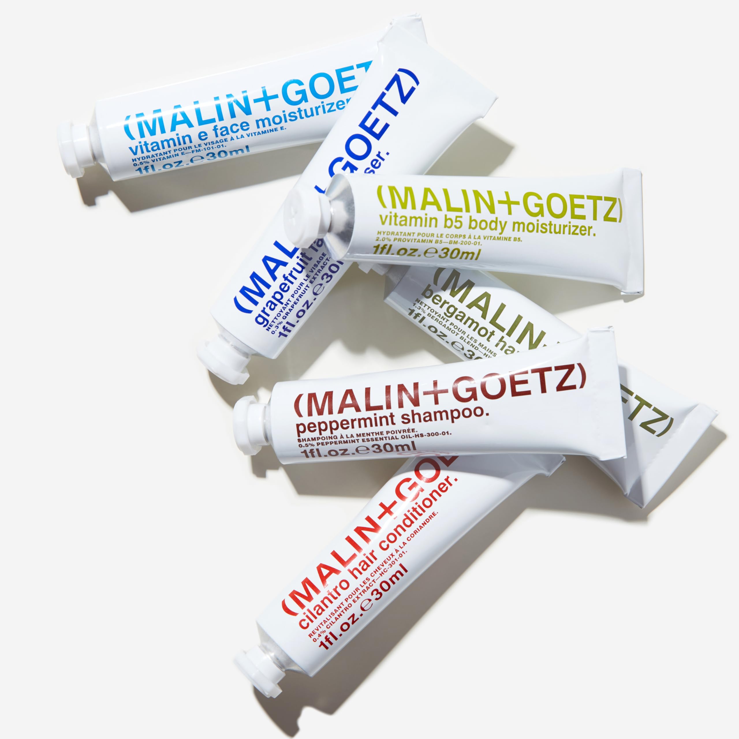 Malin + Goetz Essentials Starter Kit, Set of 6, 1 Fl. Oz. – Face Cleanser, Face Moisturizer, Hand & Body Wash, Body Moisturizer, Hair Shampoo & Conditioner - Travel Size Toiletries