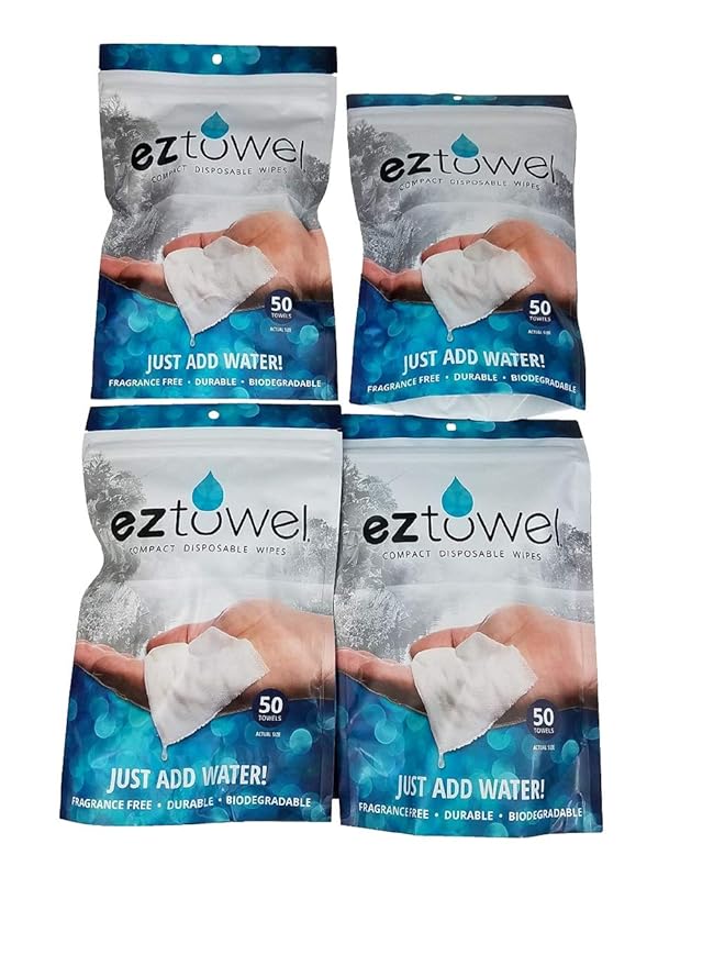 (4) NEW bags of EZ Towels Compressed towels with (4) Durable Tubes and