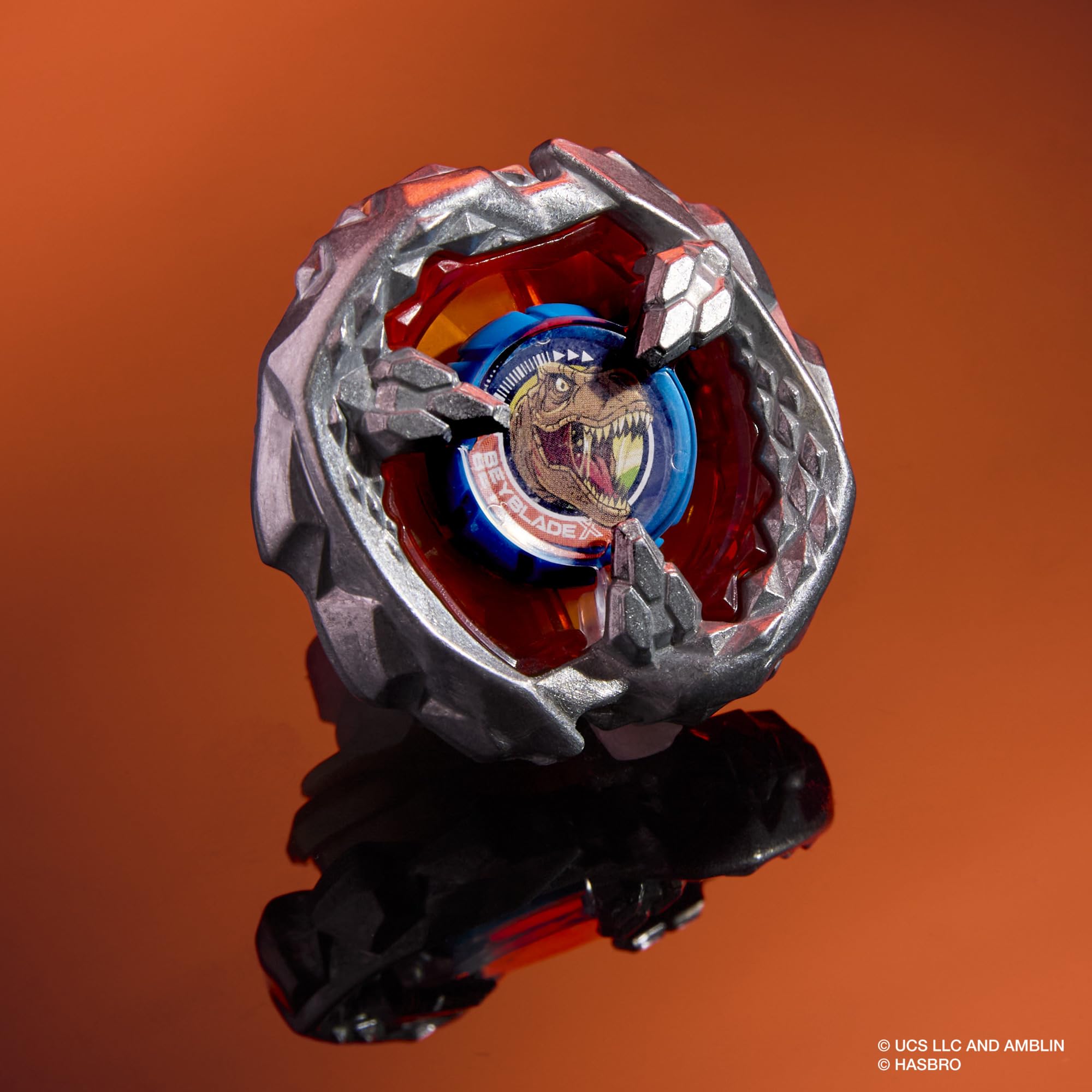 Beyblade X Jurassic World Collab T. Rex vs. Mosasaurus Multipack Set, 2 Takara Tomy Tops, 2 launchers, Battling Top Game, Dinosaur Toys, Ages 8+