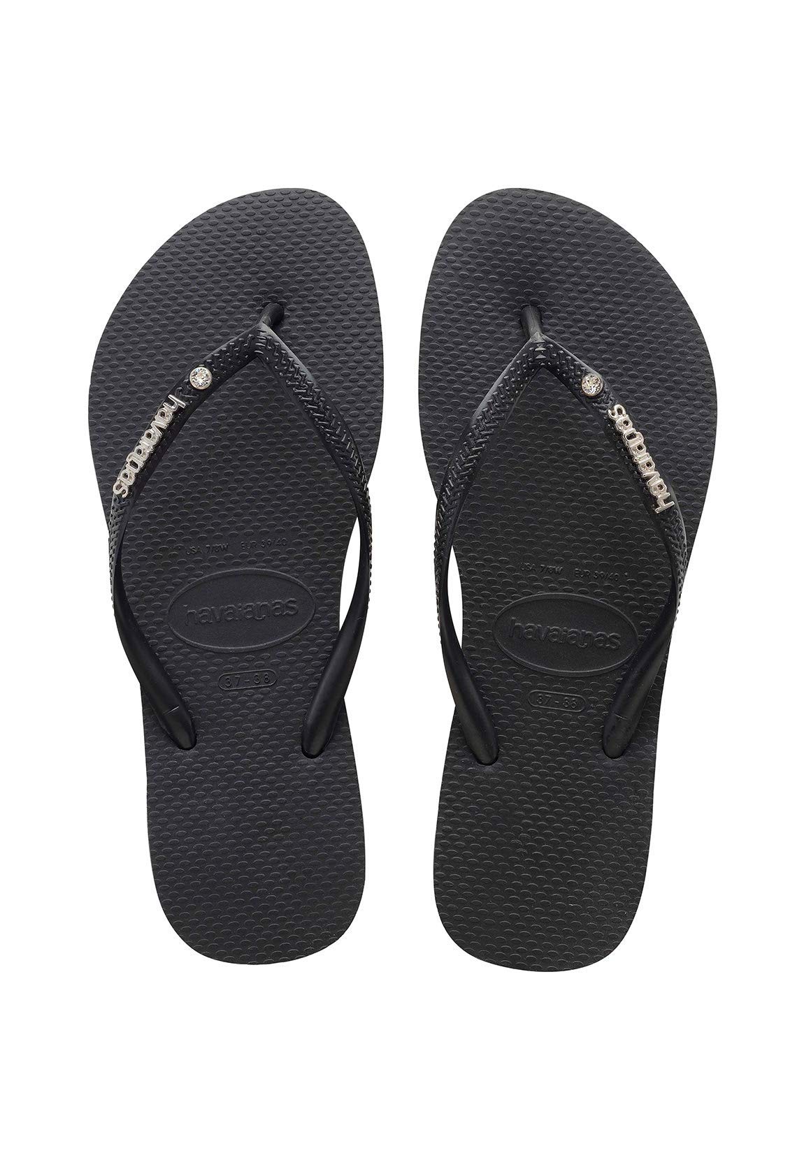 white havaianas with metal logo