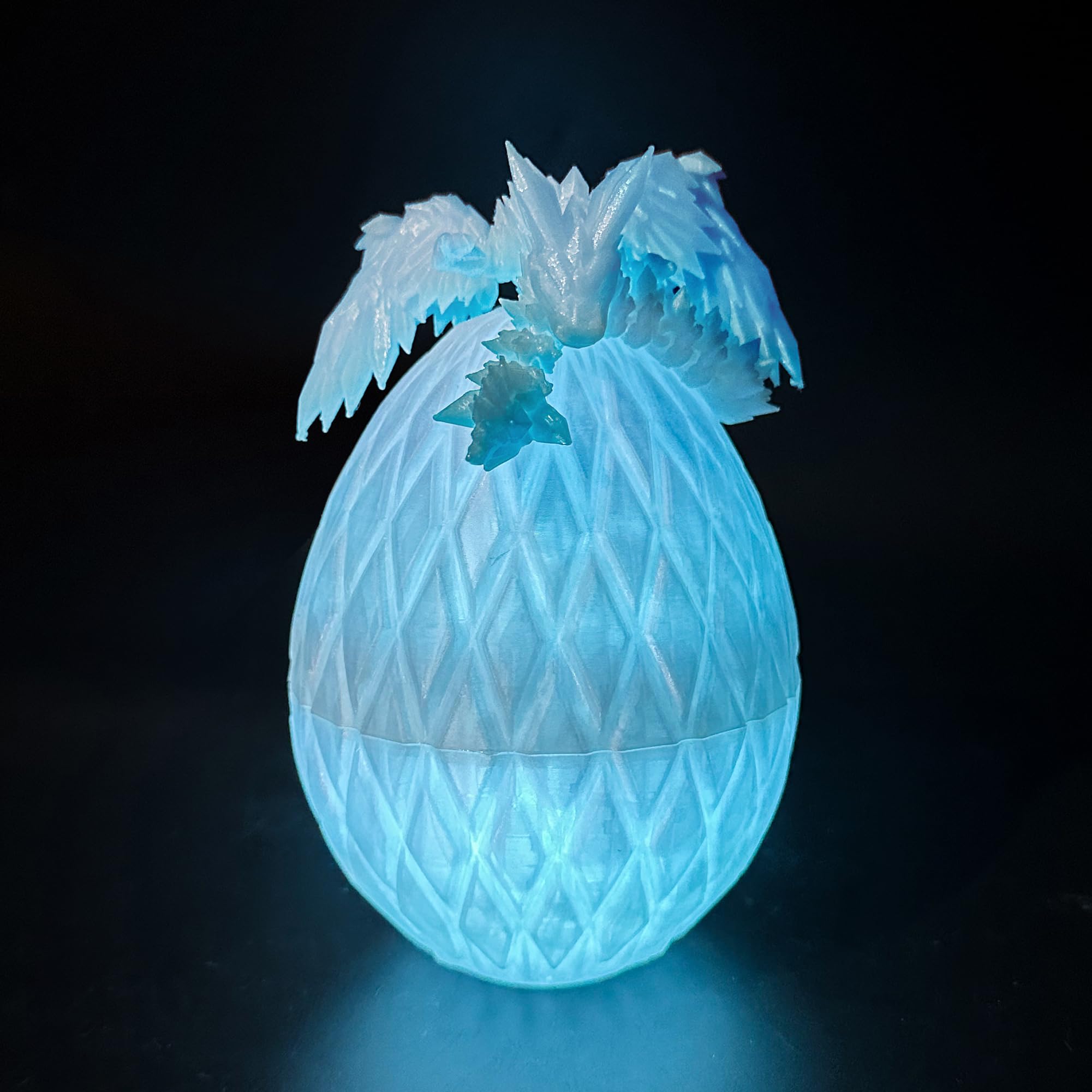 Photo 1 of Flavery 3D Printed Flying Dragon Egg - Winged Dragon in Diamond Eggs, Flexible Crystal Animal Inside, Mystery 3D Gift, Desk Decoration, Fidget Toy (Glow in The Dark Blue)