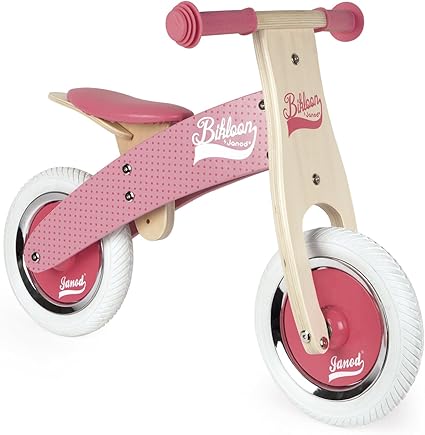 pink wooden balance bike