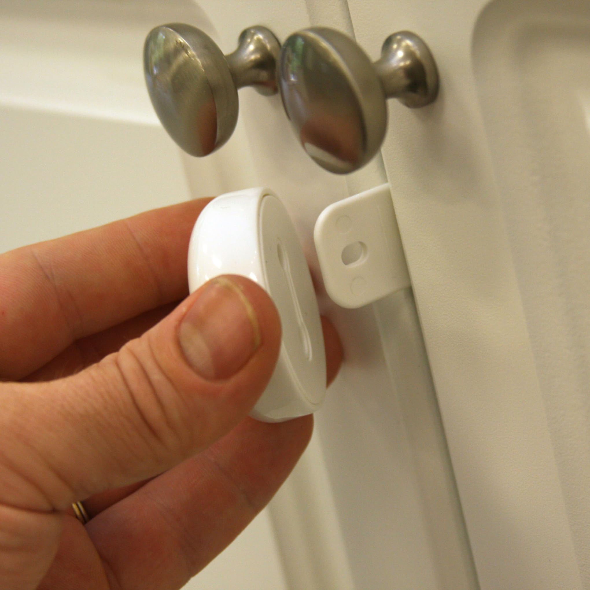 Qdos Safety Adhesive Double Door Cabinet Lock | White | Easy One Handed Operation - Patented ZeroPinch Design - Only Fits Standard Framed Cabinets and Furniture - Baby Proofing Doesn't Have to be Ugly