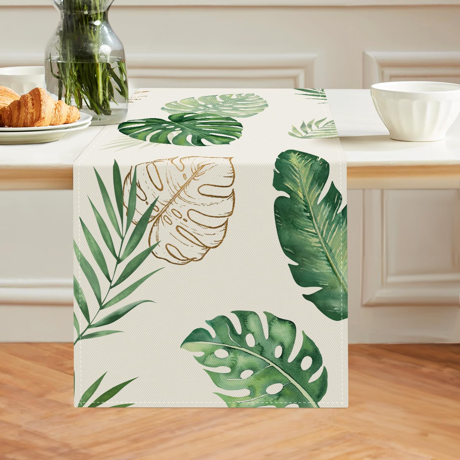 Photo 1 of Bonhause Tropical Palm Leaves Monstera Table Runner 13x72 Inch Summer Green Plant Kitchen Dinning Table Decoration for Indoor Outdoor lHome Party Decor