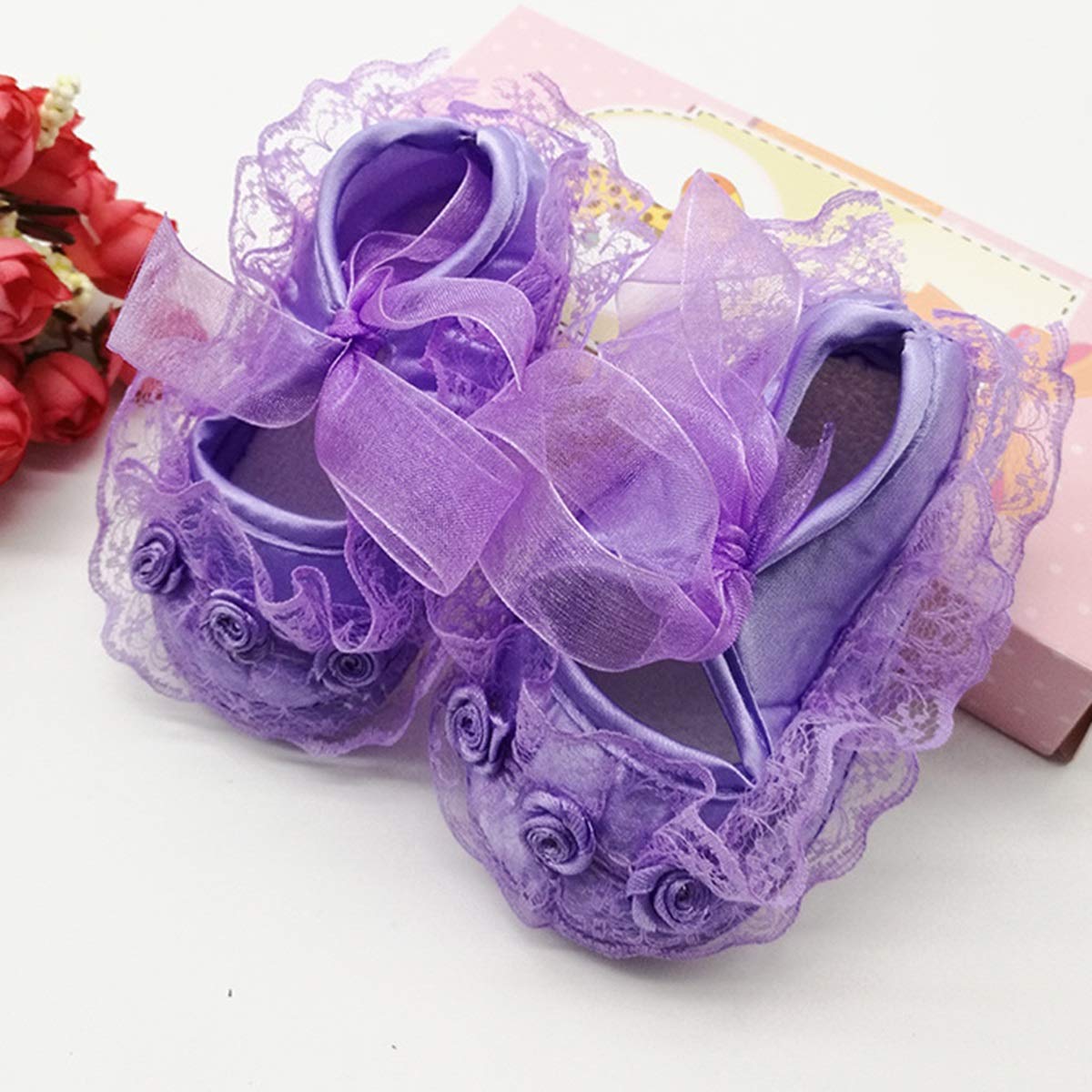 purple baby shoes