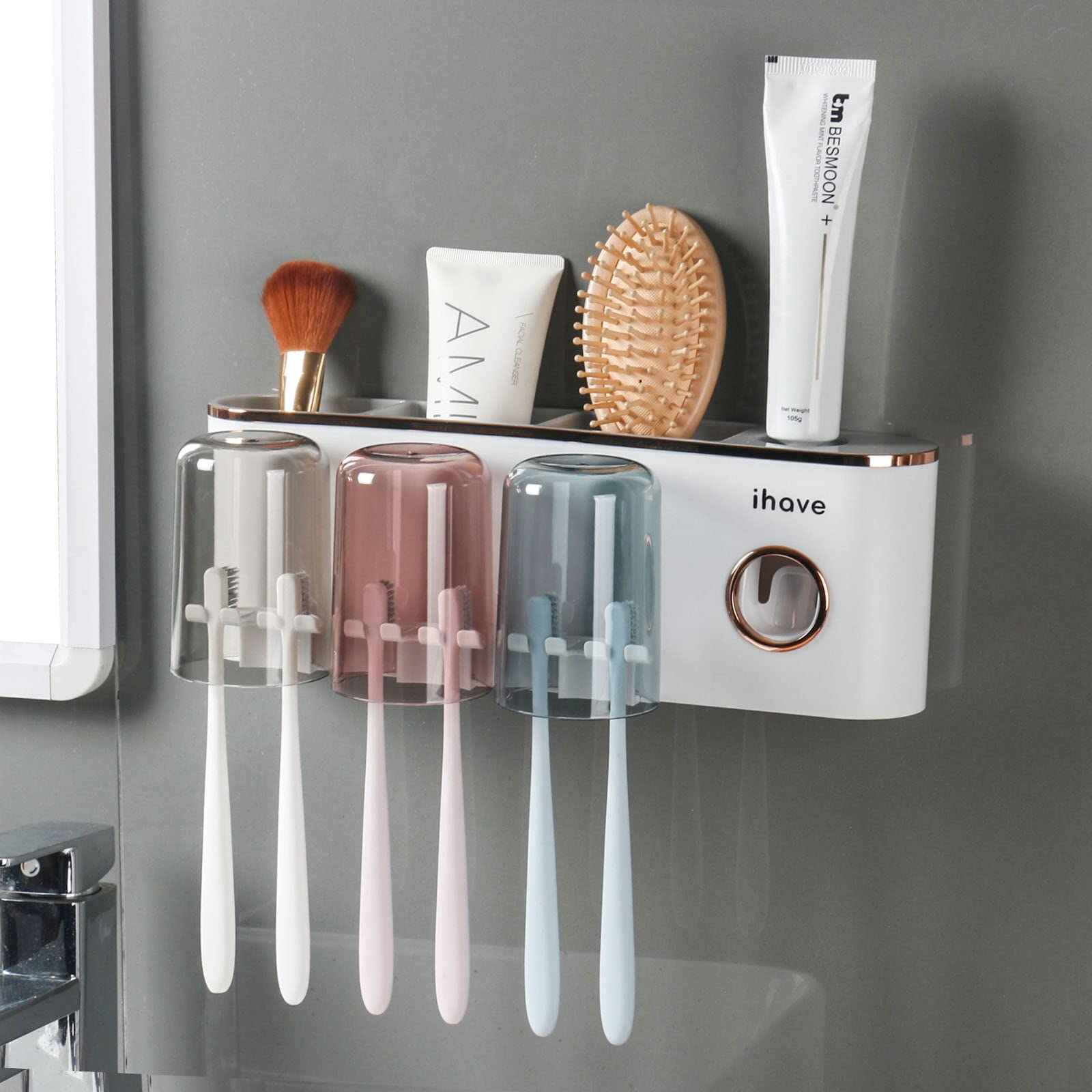 Photo 1 of ***MISSING WALL ADHESIVE*** iHave Toothbrush Holders Bathroom Accessories with Toothpaste Dispenser, 3 Cups Toothbrush Holder Wall Mounted Bathroom Decor