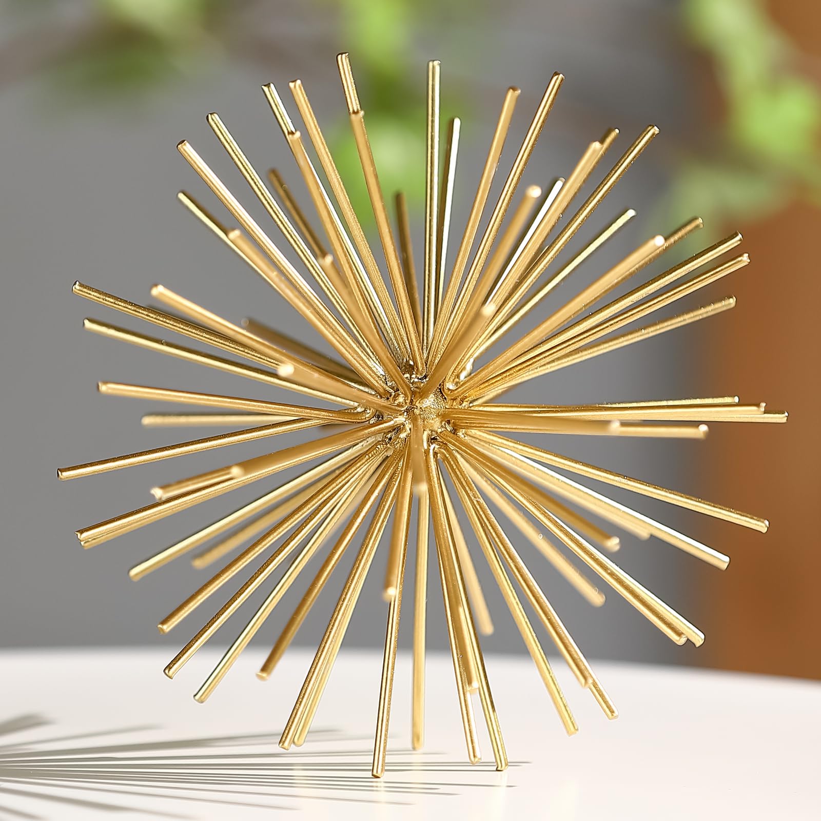 Photo 1 of Metal Decorative Starburst Ball, 6 Inch Gold Sphere Decor, Spiky Star Burst Tabletop Sculpture, Mid-Century Modern Metal Spike Ball for Home, Living Room, Office & Shelf Decor