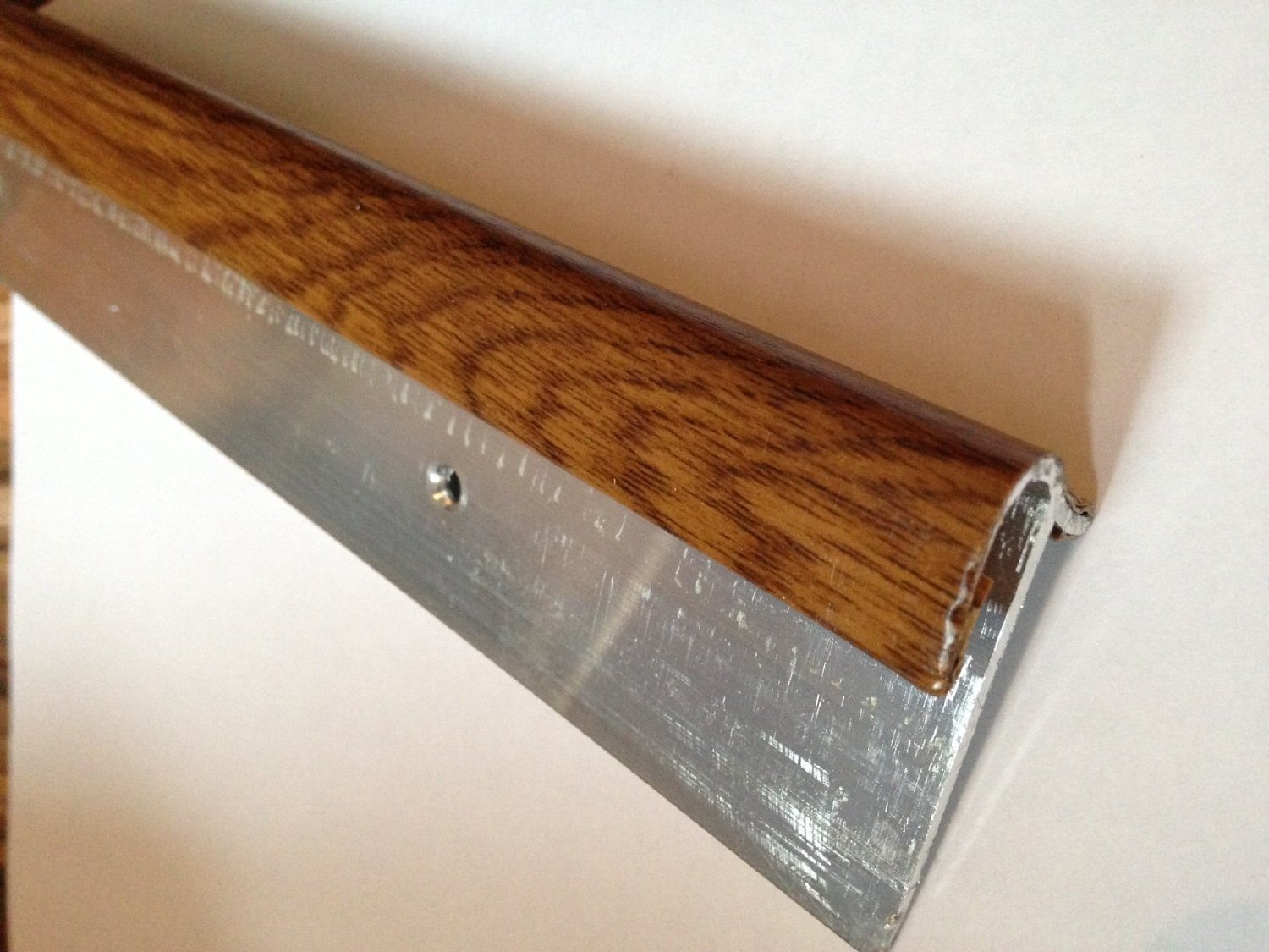 DuralSTFAF-856/0.9; 8mmStepfloor Walnut Effect Screw Down Stair Nosing Profile 0.9m; Aluminium to suit 8mm thick flooring