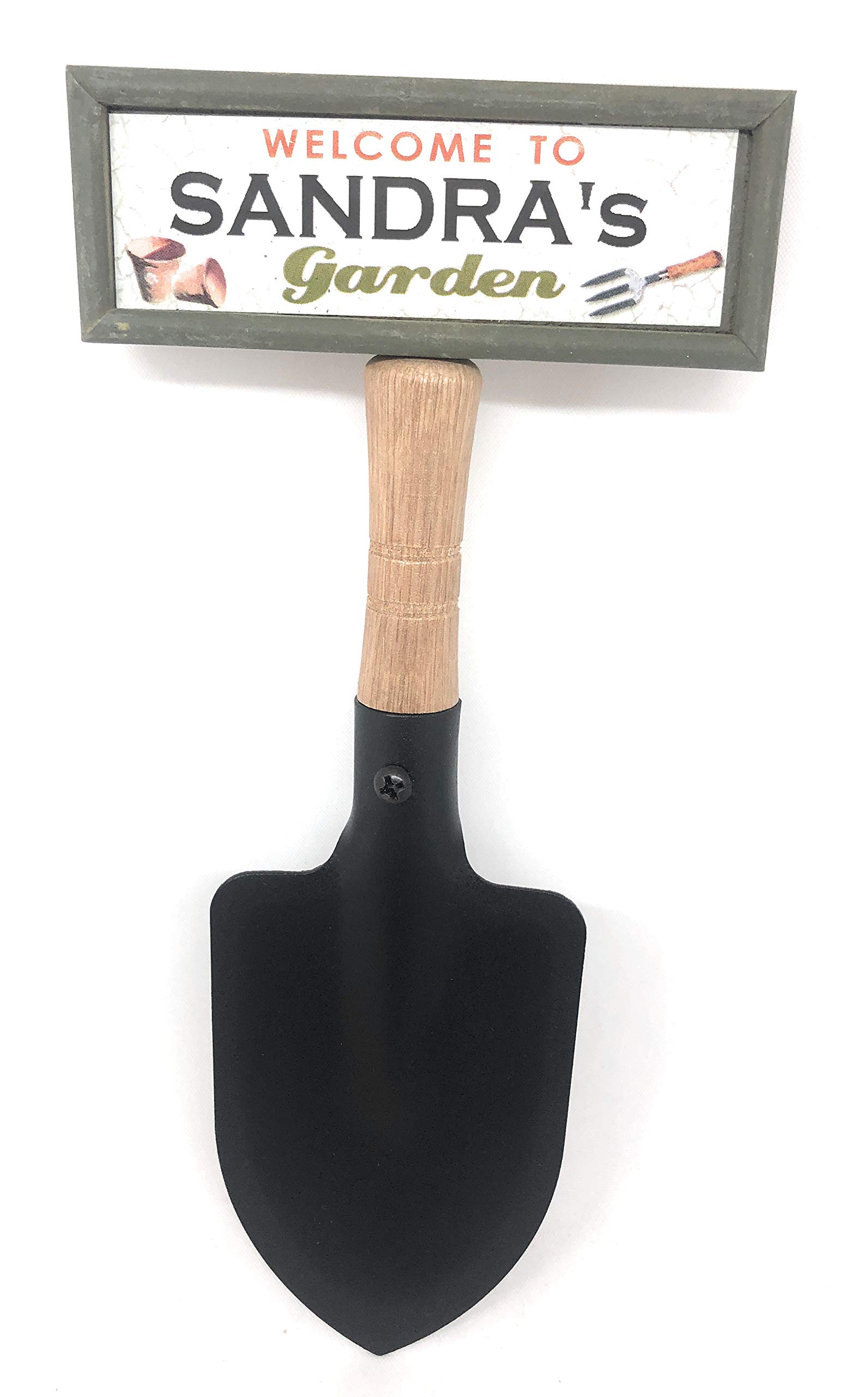 "Welcome to Sandra's garden" hanging shovel sign