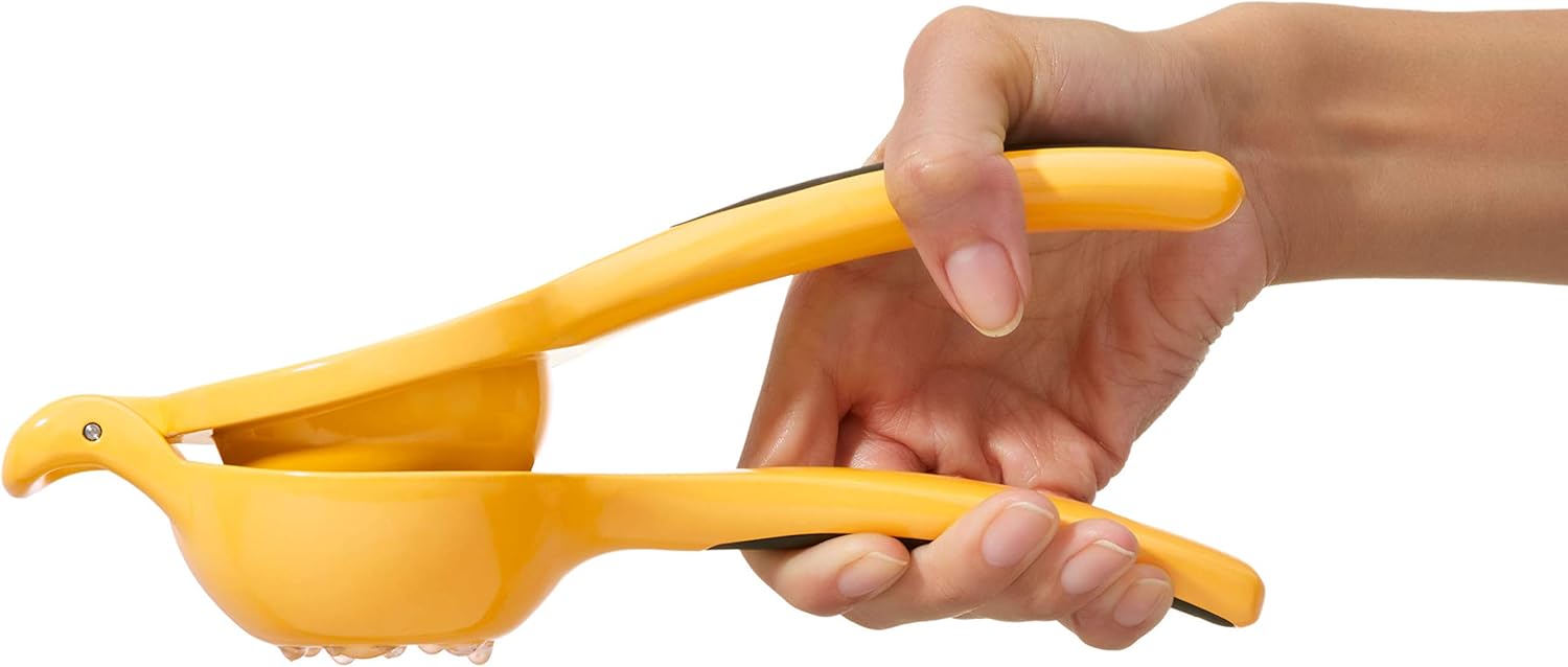 OXO Good Grips CItrus Squeezer, Yellow/Black, 10-1/2 in L x 1-1/2 in W x 4.24 in H: Hand Juicers: Kitchen & Dining