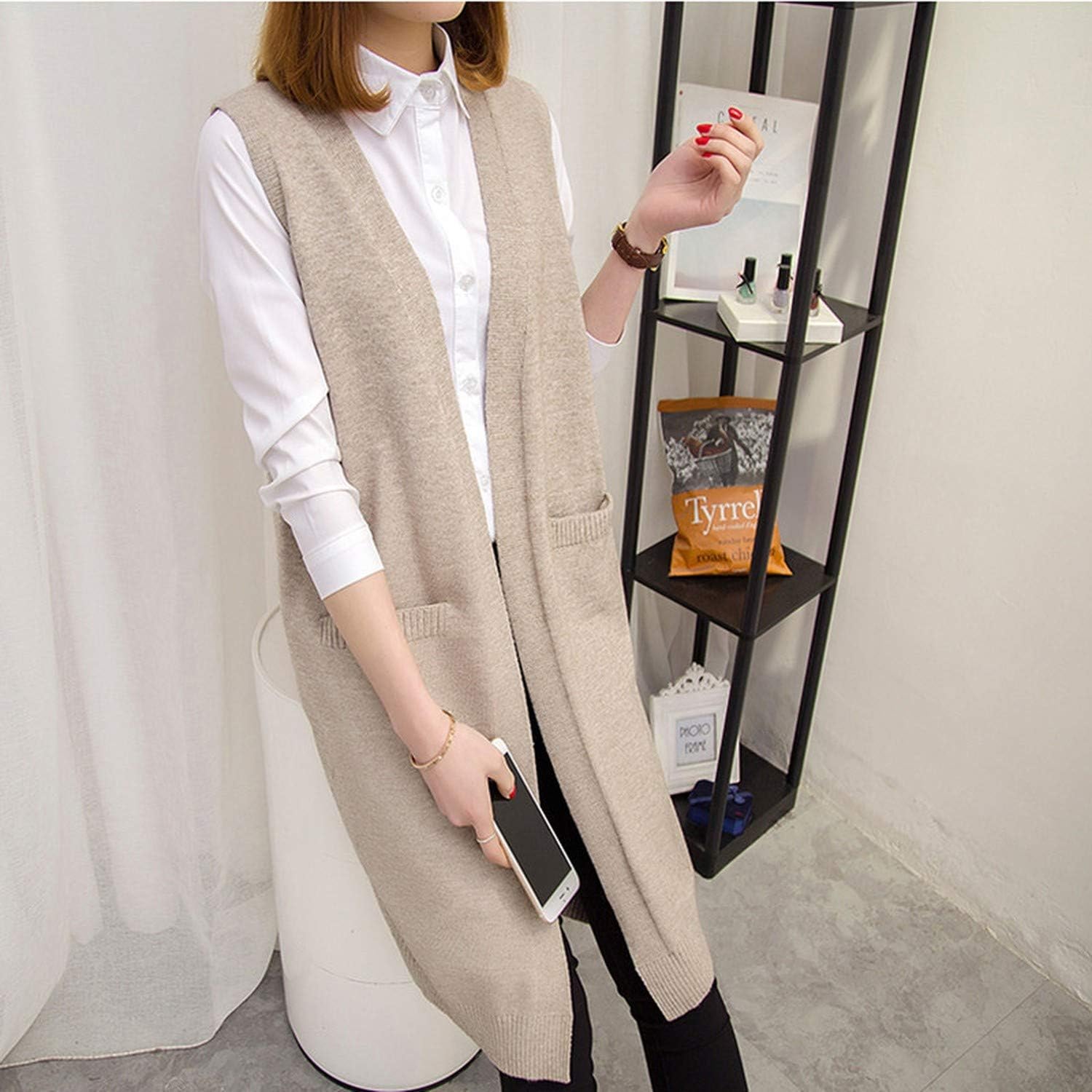 how to wear a long sweater vest