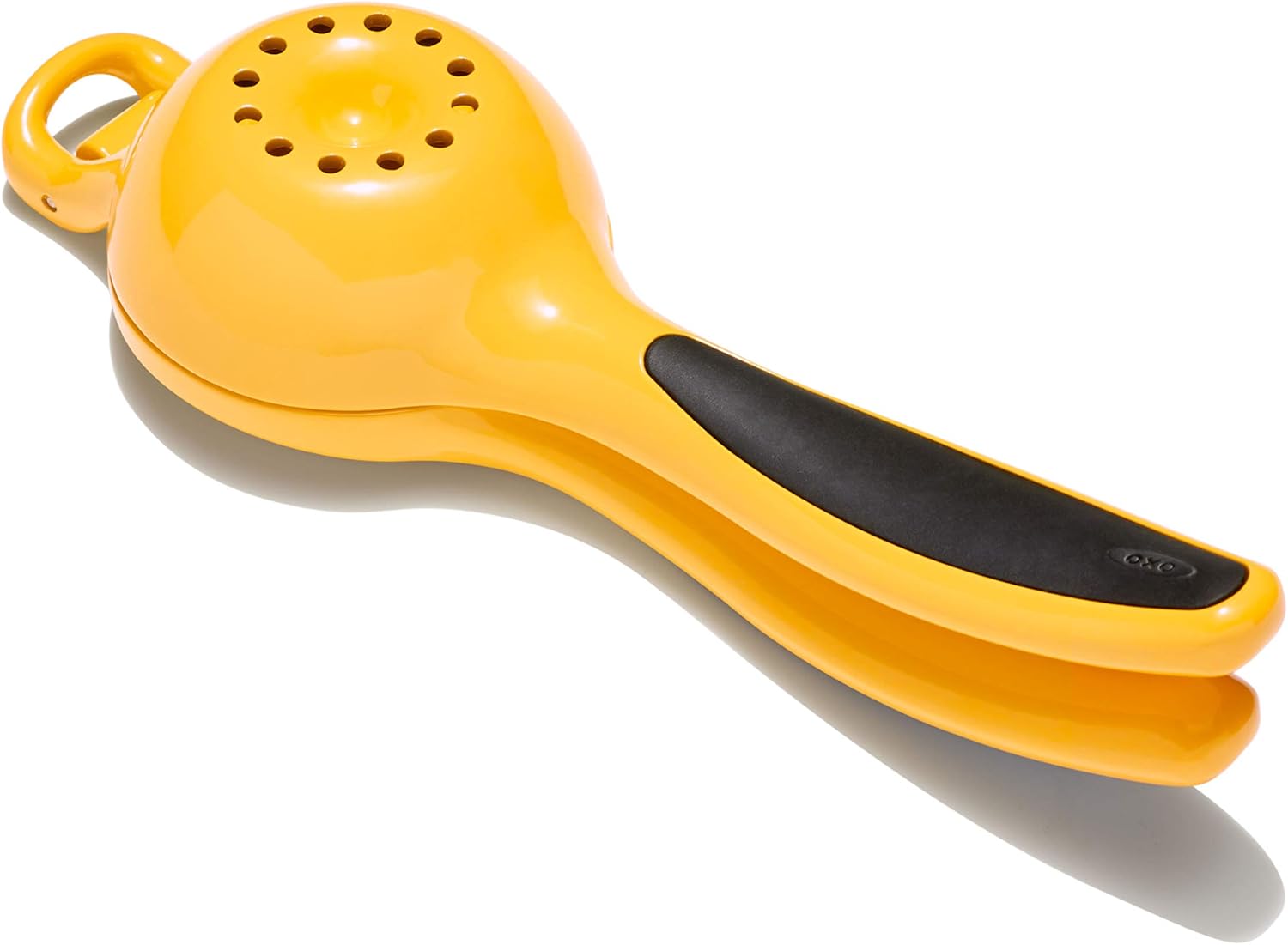 OXO Good Grips CItrus Squeezer, Yellow/Black, 10-1/2 in L x 1-1/2 in W x 4.24 in H: Hand Juicers: Kitchen & Dining