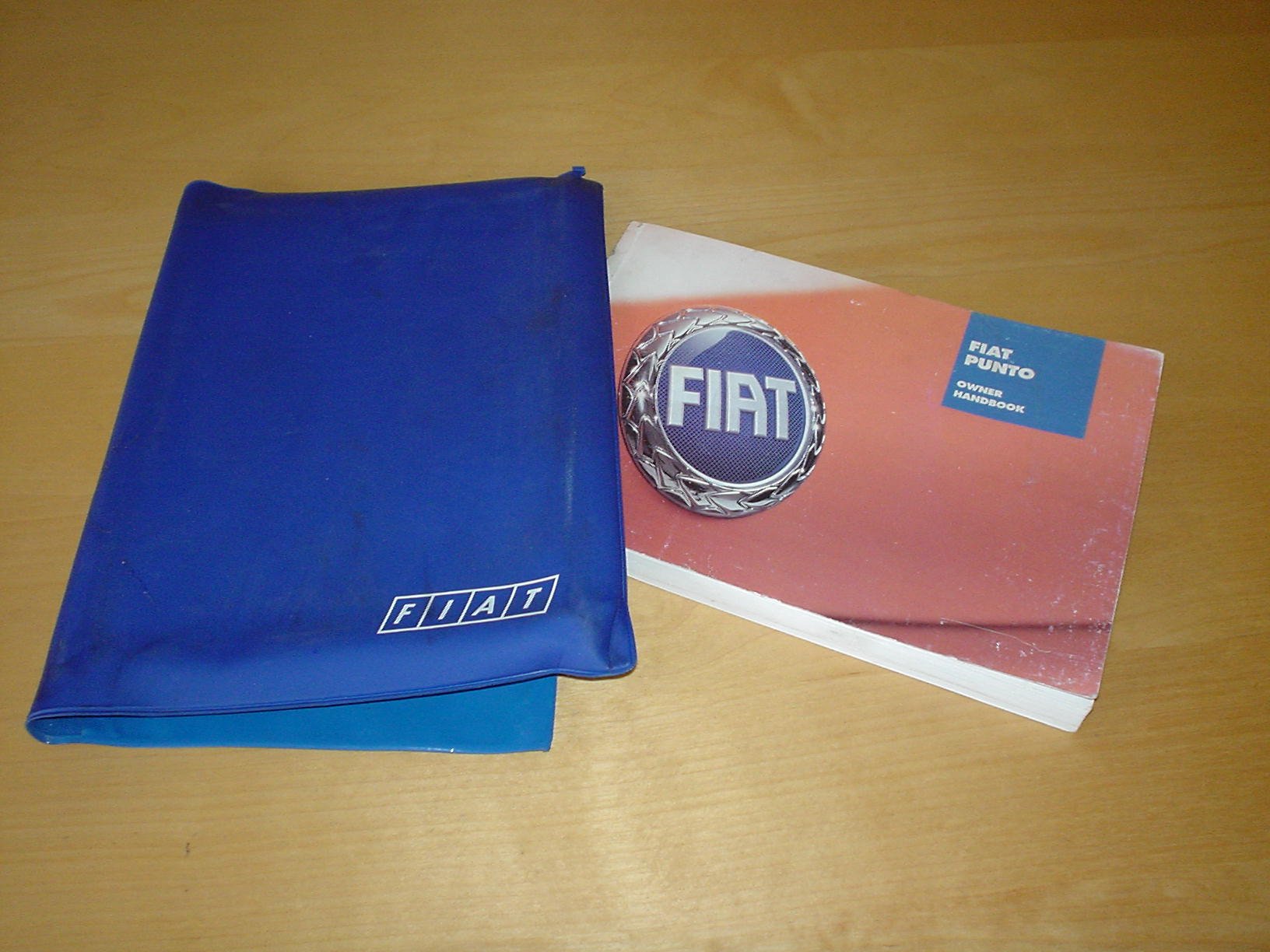 FIAT GRANDE PUNTO OWNERS MANUAL HANDBOOK c/w WALLET (2005 - 2013) EVO - 1.2  1.4 PETROL 1.3 1.9 MULTIJET ENGINE - OWNER'S HAND BOOK MANUAL Paperback –  2006