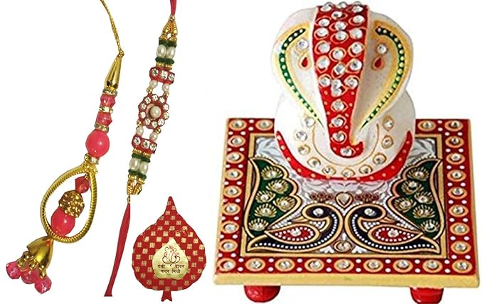 Purpledip Rakshabandhan Bhai Dooj Hamper: Marble Chowki Ganesha, 1 Bhaiyya Rakhi, 1 Bhabhi Rakhi (Latkan, Lumba) & Roli Chawal in Auspicious Red Packing (rakhi1c)