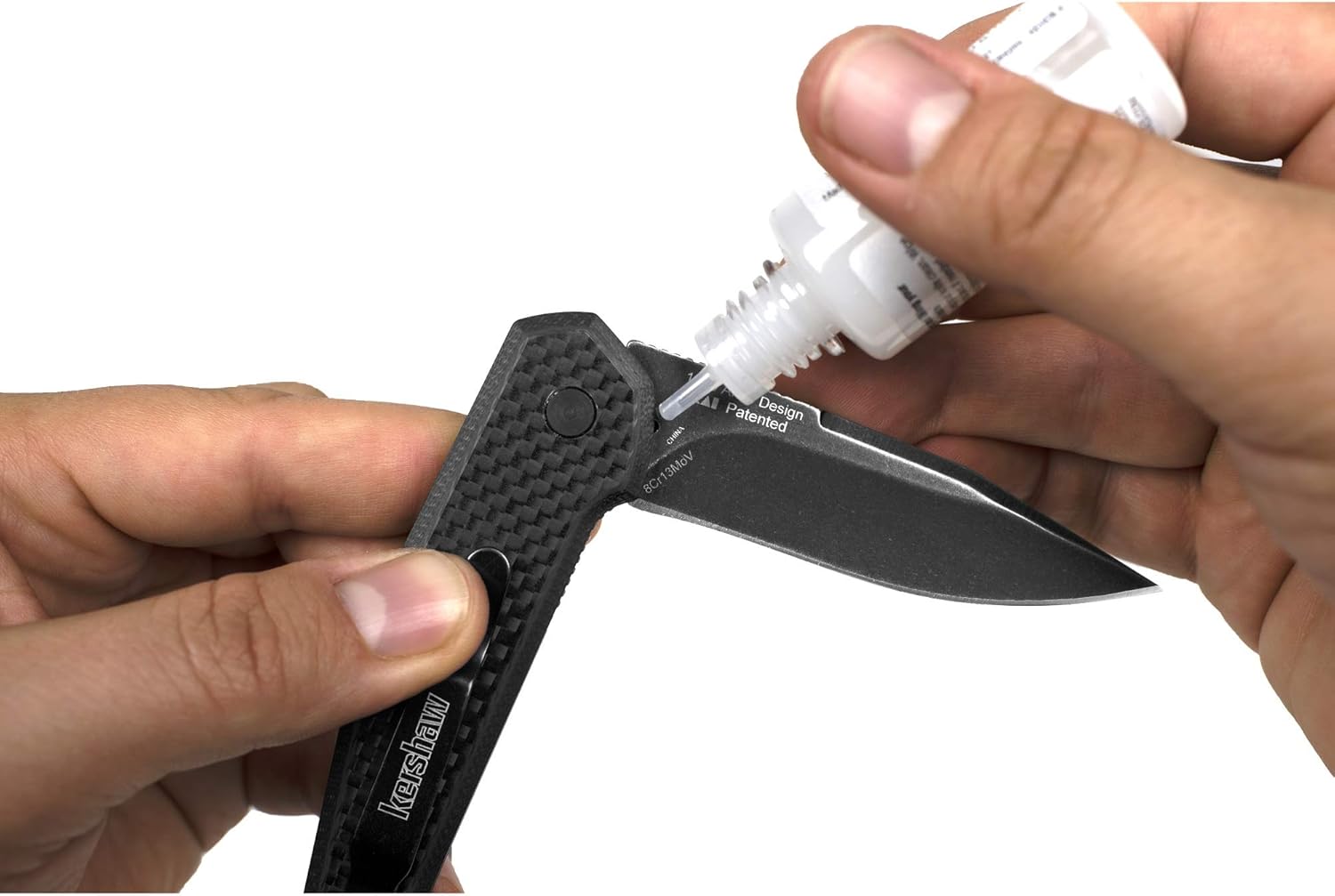 Kershaw Knife Oil (0.4 fl oz); Engineered to Protect and Enhance the Folding Mechanisms of Any Knife; Keeps Knives Sharp, Shiny and Protected; Suitable for All Types of Knives; Non-Toxic : Sports & Outdoors